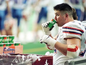 University of Florida freshman Offensive Lineman Mike Pearson #71 drinks a Gatorade after the Gators scored a touchdown in a game against University of Alabama in Atlanta, GA on Saturday, December 4, 1999. (Jeff gage, Bloomberg News)