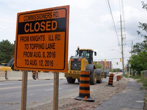 A sign informs drivers of an upcoming closure on Commissioners Road, east of Wonderland Road. The busy east-west corridor will be closed between Knights Hill Road and Topping Lane from August 8 to 12.  (CRAIG GLOVER, The London Free Press)