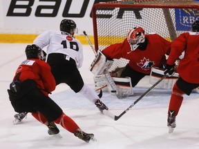 Travis Konecny scores on goalie Evan Cormier during Team Canada’s Summer Development Camp at the Master Card Centre Monday, August 1, 2016. (Dave Thomas/Toronto Sun/Postmedia Network)