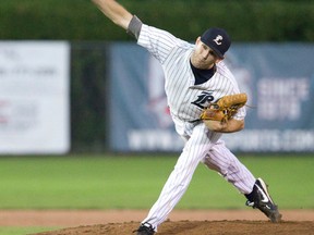 London Majors pitcher Cory Hammond fires to the plate during the Intercounty Baseball League first-place tiebreaker game against the Kitchener Panthers at Labatt Park on Monday night. Hammond threw a two-hitter to beat the Panthers 4-0 and give the Majors their first IBL pennant since 2008. (CRAIG GLOVER, The London Free Press)