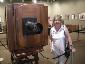 A tourist  is  dwarfed by a huge camera that welcomes people to the George Eastman Museum in Rochester, N.Y. The camera takes an image measuring almost a metre square. MITCHELL SMYTH/Special to Postmedia Network