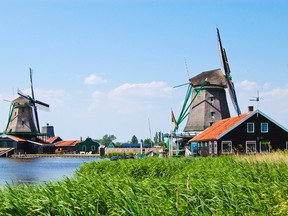 Holland’s whirring windmills harness wind energy to pump excess water into canals. CAMERON HEWITT PHOTO