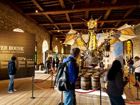 The Tower of London’s dragon, made of old weaponry, thrills  visitors young and old. DOMINIC ARIZONA BONUCCELLI PHOTO