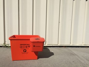 Submitted photo
An orange box with a Battery Buddy attachment. Quinte Waste Solutions announced the program, which was in the trial mode, will not continue due to a lack of use from residents.