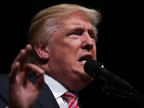 Republican presidential nominee Donald Trump speaks to voters during a campaign event at Briar Woods High School August 2, 2016 in Ashburn, Virginia. Trump continued to campaign for his run for president of the United States.  (Alex Wong/Getty Images)