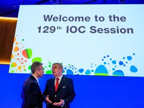International Olympic Committee (IOC) President Thomas Bach speaks with IOC Deputy Director General for Relations with the Olympic Movement Pere Miro prior to the opening of the 129th IOC session in Rio de Janeiro on August 2, 2016, ahead of the Rio 2016 Olympic Games. (AFP/Getty Images)
