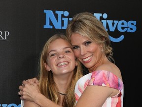 Catherine Rose Young, left, and Cheryl Hines attend the premiere of "Nine Lives" in Hollywood, Calif., August 1, 2016. (FayesVision/WENN.COM)