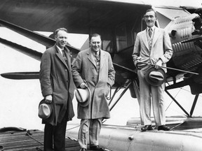 Famed aviator Wop May, Dr. W.G. Stedman and I.W.C. Holloway, investors in Commercial Airways, are seen at the Cooking Lake seaplane base around 1929.