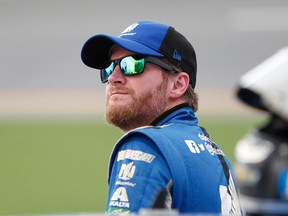 Dale Earnhardt Jr. watching the leader-board during qualifying for a NASCAR Sprint Cup auto race at Daytona International Speedway in Daytona Beach, Fla. (AP Photo/Wilfredo Lee, File)