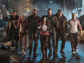 This image released by Warner Bros. Pictures shows, from left, Jai Courtney as Boomerang, Margot Robbie as Harley Quinn, Will Smith as Deadshot, Karen Fukuhara as Katana, Joel Kinnaman as Rick Flag, Adewale Akinnuoye-Agbaje as Killer Croc and Jay Hernandez as Diablo, in a scene from "Suicide Squad." (Clay Enos/Warner Bros. Pictures)