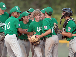 The East Nepean Eagles celebrate after winning the Junior League Ontario Championships against Windsor West  on July 27, 2016. (Jason Kryk/WINDSOR STAR)