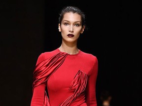 Bella Hadid walks the runway during the Atelier Versace Haute Couture Fall/Winter 2016-2017 show as part of Paris Fashion Week on July 3, 2016 in Paris, France. (Pascal Le Segretain/Getty Images)