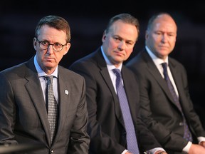 Winnipeg Jets owner Mark Chipman (left), former Jet Dale Hawerchuk and Edmonton Oilers vice chairman Kevin Lowe at the press conference announcing the Heritage Classic earlier this year. (Brian Donogh/Winnipeg Sun file photo)