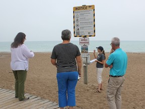 Communities in Bloom judges Colleen Stockford and Sylvie Cormier spent time in Goderich last week reviewing different spots in town to determine whether it qualifies for the Circle of Excellence. Representatives  from the Lake Huron Centre for Coastal Conservation spent time telling the judges about the beach butt clean up initiative. (Laura Broadley/Goderich Signal Star)