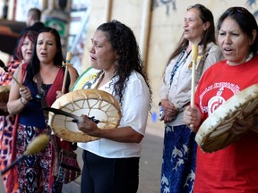 Women drum following the announcement of the inquiry into Murdered and Missing Indigenous Women at the Museum of History in Gatineau, Quebec on Wednesday, Aug. 3, 2016.THE CANADIAN PRESS/Justin Tang