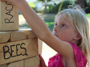 Samantha Reed/The Intelligencer
Seven-year-old Ellie Smithers of Kemptville builds a structure with building blocks during one of the activities for the Wild About Wildlife Family Nature Days in Wellington.