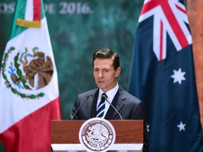 Mexican President Enrique Pena Nieto delivers a speech during the welcoming ceremony in honour of Australian Governor-General Sir Peter Cosgrove (out of frame) at the National Palace in Mexico City on August 1, 2016. Cosgrove arrived in Mexico on an official visit. / AFP / ALFREDO ESTRELLA (Photo credit should read ALFREDO ESTRELLA/AFP/Getty Images)