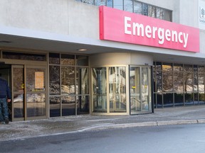 A man walks into the emergency department at University Hospital in London, Ontario on Sunday January 12, 2014. (File photo)