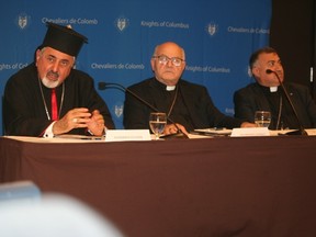 From left, Patriarch Ignatius Joseph III Younan of the Syriac Catholic Church, Archbishop Jean-Clement Jeanbart of Syria, and Archbishop Bashar Warda of Iraq call on Canada to provide more direct aid to persecuted Christians in the Middle East.