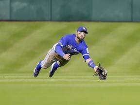 Kevin Pillar of the Toronto Blue Jays makes a diving catch on a line drive by Jose Altuve of the Houston Astros at Minute Maid Park on August 3, 2016 in Houston, Texas. (Bob Levey/Getty Images)