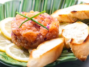 Salmon tartare with red onion is pictured in this file photo. (phbcz/Getty Images)