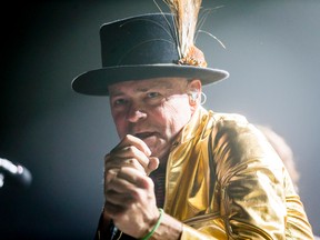 Gord Downie leads a Tragically Hip concert in Calgary on Monday. On Thursday, Winnipeg police announced they had arrested two people allegedly scalping tickets for Friday's show at MTS Centre. (Lyle Aspinall/Postmedia Network)