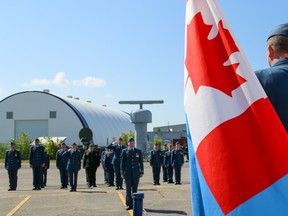 Tim Miller/The Intelligencer
Members of 8 Air Communication and Control Squadron (ACCS) stand at attention during a change of command ceremony on Thursday August 4, 2016 in CFB Trenton.