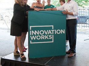 Michelle Baldwin (left), Annette Markvoort, Tonya Surman, Paulette Soscia, Maureen Spencer Golovchenko and Mayor Matt Brown celebrate the grand opening of Innovation Works July 22 in London Ont. (Photo submitted)