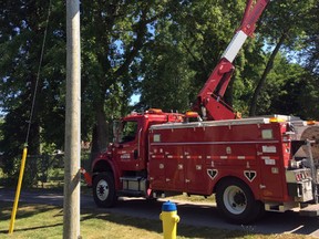 Bluewater Power lineman Tom Valiquette works on a hydro pole on Huronview Trail on Thursday, Aug. 4, 2016 in Bright's Grove, Ont. Bluewater Power Distribution Corp. is celebrating its 100th anniversary in 2016 as the Sarnia Hydro-Electric Commission, one of six former commissions amalgamated to create Bluewater Power in 2000, was launched on Nov. 27, 1916. Handout/Sarnia Observer/Postmedia Network