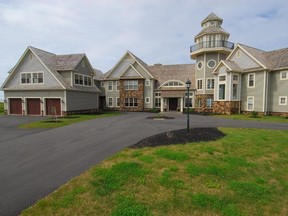 This beachfront mansion in Cable Head East, P.E.I. features a whale-watching tower, accessible by spiral staircase.