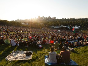 Crowd listens as The Barr Brothers perform on the main stage during the Edmonton Folk Music Festival at Gallagher Park in Edmonton, Alberta on Thursday, August 4, 2016. Ian Kucerak / Postmedia