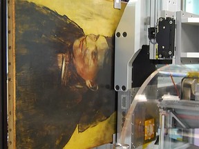 This undated handout picture released on August 4, 2016 by the Nature publishing Group shows an Edgar Degas painting "Portrait of a Woman" as it appears during the imaging scan. The MAIA Detector is carefully positioned less than 2 mm from the paintings surface in order to achieve the highest quality data. The detector collects data simultaneously over 384 channels, which means that much higher resolutions are achieved in much shorter time spans when compared to single point detectors. An experiment that would take weeks of beam time by conventional methods is reduced to only 20 to 30 hours. (AFP PHOTO / NATURE / David Thurrowgood )