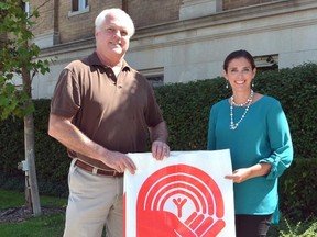 United Way Elgin-St. Thomas board president Doug Butler, left, introduces the agency's new development officer Bobbi-Jo Gardiner. Gardiner, who has lived in St. Thomas for years, has worked in fundraising roles with the United Ways of Ottawa and London-Middlesex.