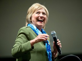 Democratic presidential candidate Hillary Clinton pauses while speaking at a rally at Adams City High School in Commerce City, Colo., Wednesday, Aug. 3, 2016. (AP Photo/Andrew Harnik)