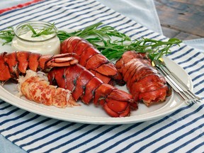 This May 23, 2016 photo shows a plate of lobster tails with Pastis creme, styled by Sarah Abrams, at the Institute of Culinary Education in New York. This dish is from a recipe by Elizabeth Karmel. (AP Photo/Richard Drew)