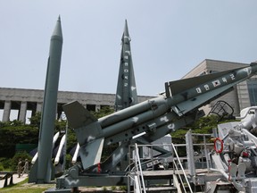 South Korea's mock missiles are displayed next to North Korea's mock Scud-B, left, at the Korea War Memorial Museum in Seoul, South Korea, in this Friday, July 8, 2016 file photo. (AP Photo/Lee Jin-man)