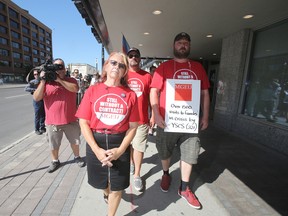 MGEU President, Michelle Gawronsky, joined members of Macdonald Youth Services (MYS) Crisis Stabilization, Local 221, on the picket line, in Winnipeg.  Tuesday, August 02, 2016.  Sun/Postmedia Network