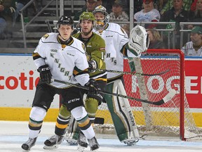 Olli Juolevi (front), seen here playing for the OHL's London Knights last season, signed a three-year entry level contract with the Canucks on Friday, Aug. 5, 2016. (Claus Andersen/Getty Images/Files)