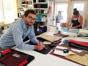 Sven Schlegel of Mariclaro stands in the company's workshop in Snow Road Station where leather from old luxury cars and airliners are recycled into bags.  (Elliot Ferguson/The Whig-Standard)