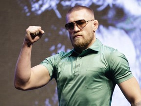 Conor McGregor arrives at a UFC 202 mixed martial arts news conference, July 7, 2016, in Las Vegas. (AP Photo/John Locher)