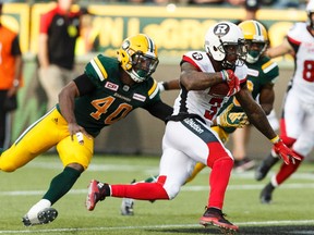 Edmonton's Deon Lacey (40) chases Ottawa's Travon Van (3) during a CFL game between the Edmonton Eskimos and the Ottawa Redblacks at the Brick Field at Commonwealth Stadium in Edmonton on Saturday, June 25, 2016. The Eskimos are in Ottawa to face the Redblacks on Saturday.