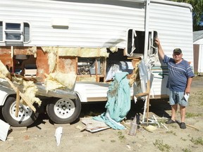 Photo by KEVIN McSHEFFREY/THE STANDARD Roland Foisy and his wife Rite returned home to Elliot Lake after the long weekend to discover that a bear had ripped open a section of their travel trailer, causing significant damage.