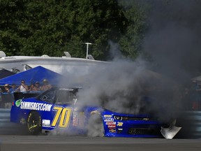Smoke evelopes the #70 E-hydrate/Sammys Best Chevrolet driven by Derrike Cope after an on-track incident during the NASCAR XFINITY Series Zippo 200 in Watkins Glen, N.Y., on Saturday, Aug. 6, 2016. (Chris Trotman/Getty Images)