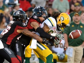 Edmonton Eskimos' Derel Walker (87) fumbles the ball against the Ottawa Redblacks during first half CFL action on Saturday, Aug. 6, 2016 in Ottawa. THE CANADIAN PRESS/Justin Tang