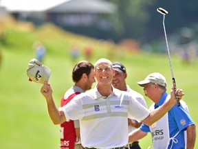 Jim Furyk of the United States celebrates after shooting a record setting 58 during the final round of the Travelers Championship at TCP River Highlands on August 7, 2016 in Cromwell, Connecticut.  (Steven Ryan/Getty Images)