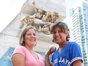 Bella Arcand, 11 of Saskatchewan, and her mom Bev Laford — along with 25 family members — are in town to watch Bella throw out the first pitch at Tuesday night's Blue Jays game. (JACK BOLAND, Toronto Sun)
