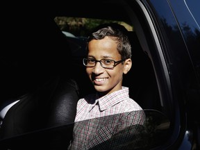 In this Sept. 17, 2015 file photo, Ahmed Mohamed sits in a vehicle before leaving his family's home in Irving, Texas. The family of Ahmed Mohamed, who was arrested after a homemade clock he brought to school was mistaken for a bomb, filed a lawsuit Monday, Aug. 8, 2016, against Texas school officials saying they violated the boy's civil rights. (AP Photo/LM Otero, File)