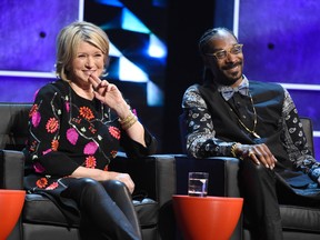 In this March 14, 2015, file photo, Martha Stewart, left, and Snoop Dogg appear on stage at the Comedy Central Roast of Justin Bieber at Sony Pictures Studios in Culver City, Calif. VH1 announced August 8, 2016, that the two stars will host a new show this fall with a working title of “Martha & Snoop’s Dinner Party.” (Photo by Chris Pizzello/Invision/AP, File)