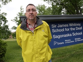 Emily Mountney-Lessard/Intelligencer file photo
Mike Lehman, whose son Josh attends Sagonaska School, participated in a rally outside the school on Wednesday June 8, 2016 in Belleville.
