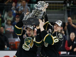 Mitchell Marner #93 and Christian Dvorak #10 of the London Knights (OHL) celebrate after defeating the Rouyn-Noranda Huskies (QMJHL) during the Memorial Cup Final on May 29, 2016 at the Enmax Centrium in Red Deer, Alberta, Canada.  Codie McLachlan/Getty Images/AFP